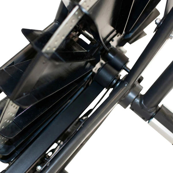 Close-up of black mechanical seed planter row unit components
