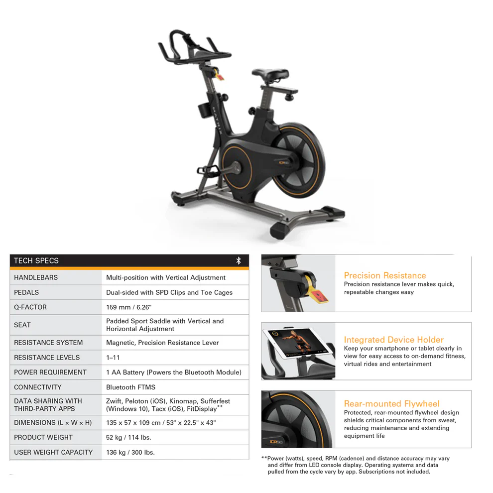 Black indoor cycling spin bike with orange accents and specs