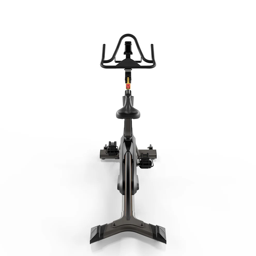 Black indoor spinning exercise bike on white background