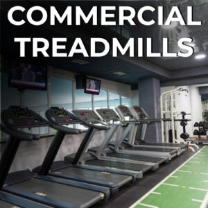 Row of commercial treadmills in a modern gym
