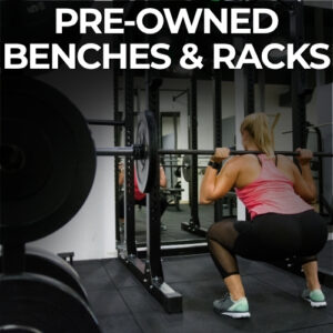 Woman squatting with barbell on pre-owned power rack