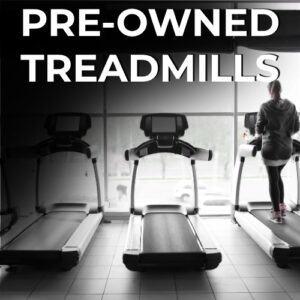 Woman running on treadmill in gym, pre-owned treadmills