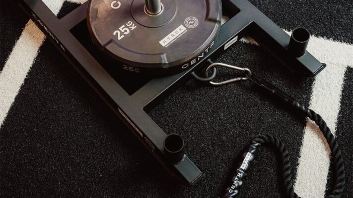 Centr x Hyrox 25kg weighted sled on gym floor
